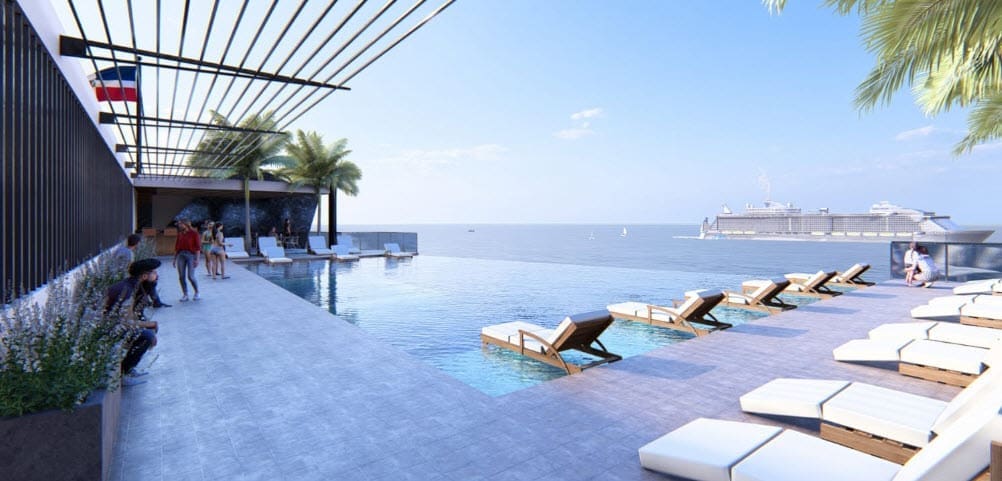 buyDRproperty Luxury infinity pool with cruise ship and palm trees Sosua Real Estate