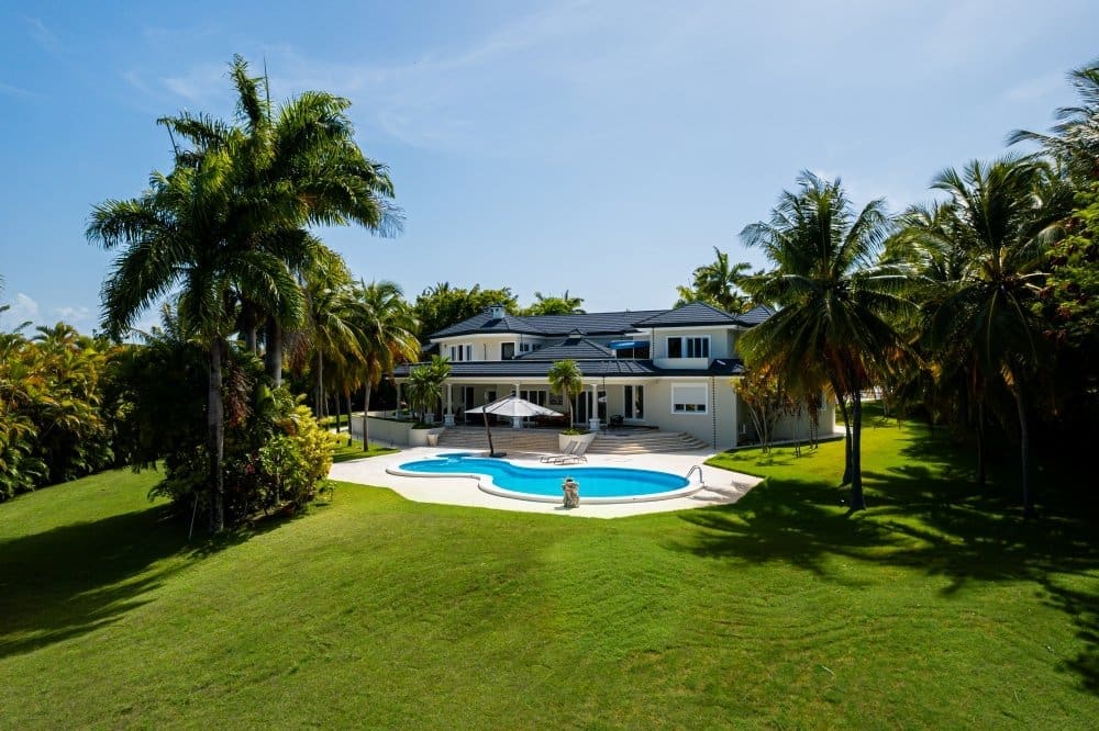 buyDRproperty Luxury tropical villa with infinity pool and palm trees Sosua Real Estate